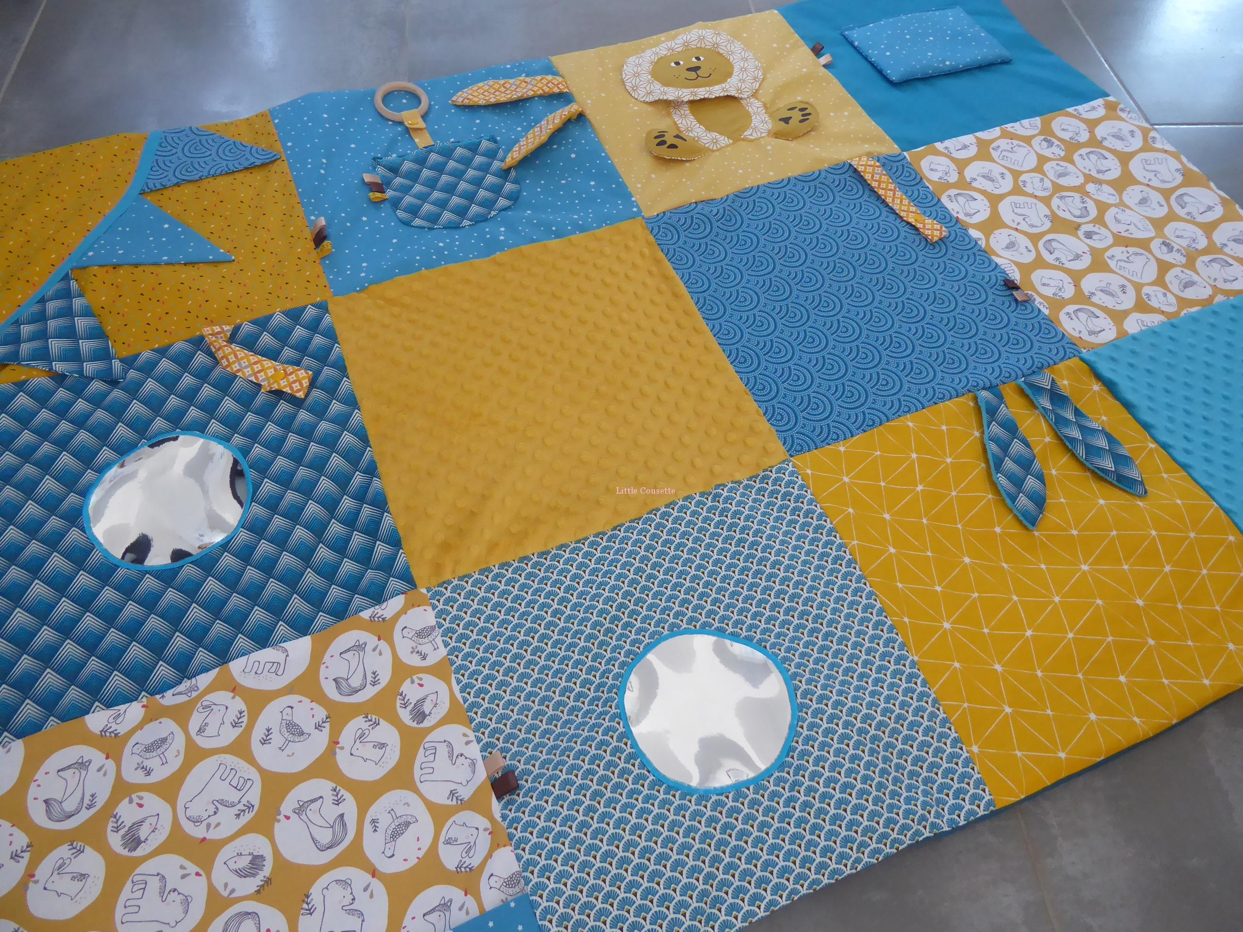 découvrez comment créer un tapis d'éveil montessori diy pour stimuler le développement de votre bébé avec des matériaux naturels et des activités ludiques. apportez une touche personnalisée à l'éveil de votre enfant tout en respectant la méthode montessori.